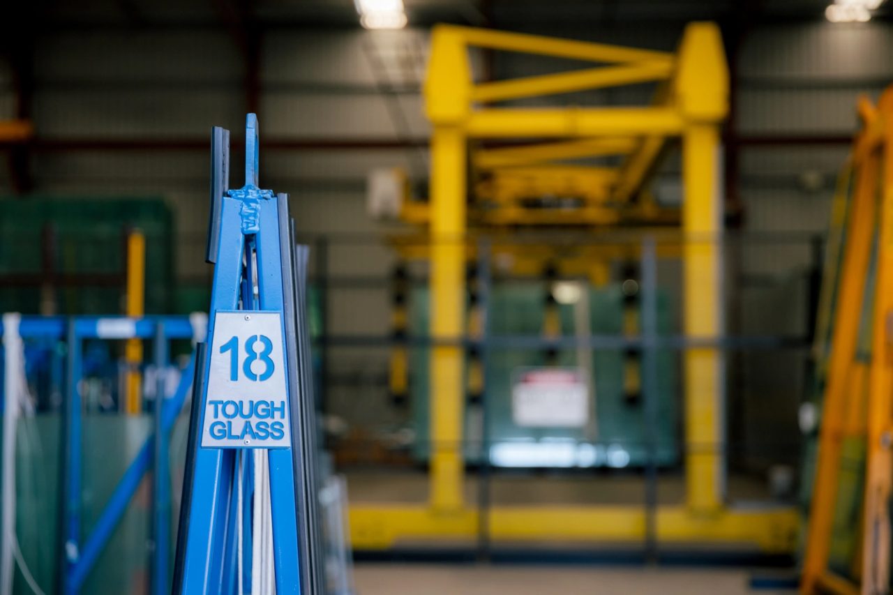 Glass rack marker identifying 18 millimetre glass in the Tough Glass facility.