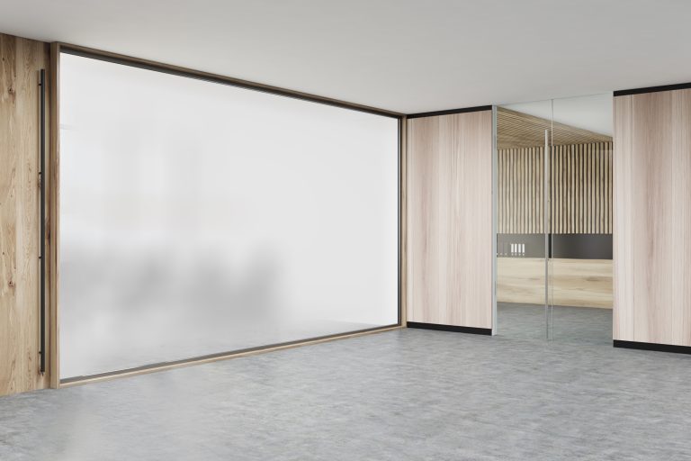 ToughSwitch privacy glass in opaque mode enclosing a meeting room.